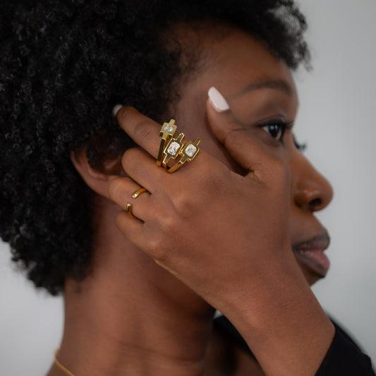 High Polished Ring with Flush-Set Emerald Cut Stone