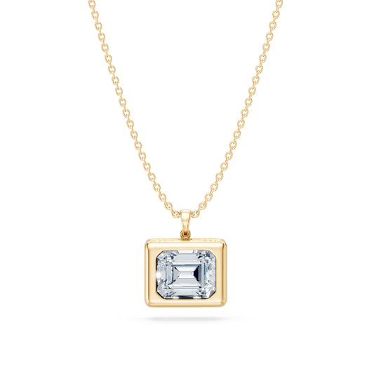 Oversized High Polished Ring with Flush-Set Emerald Cut Stone